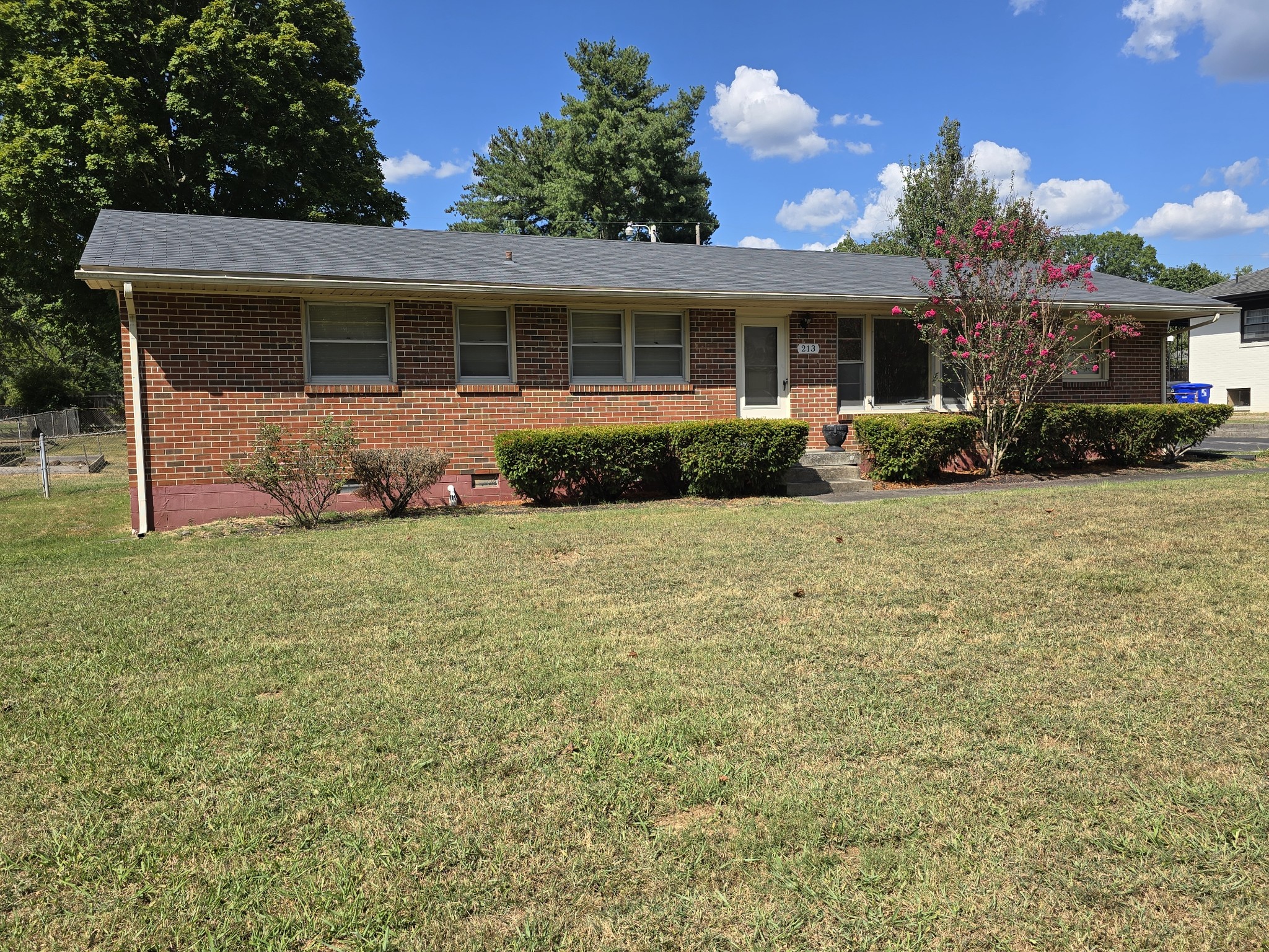 213 Jackson Heights Road Columbia, TN 38401 - Photo 2 of 19 a front view of a house with a garden