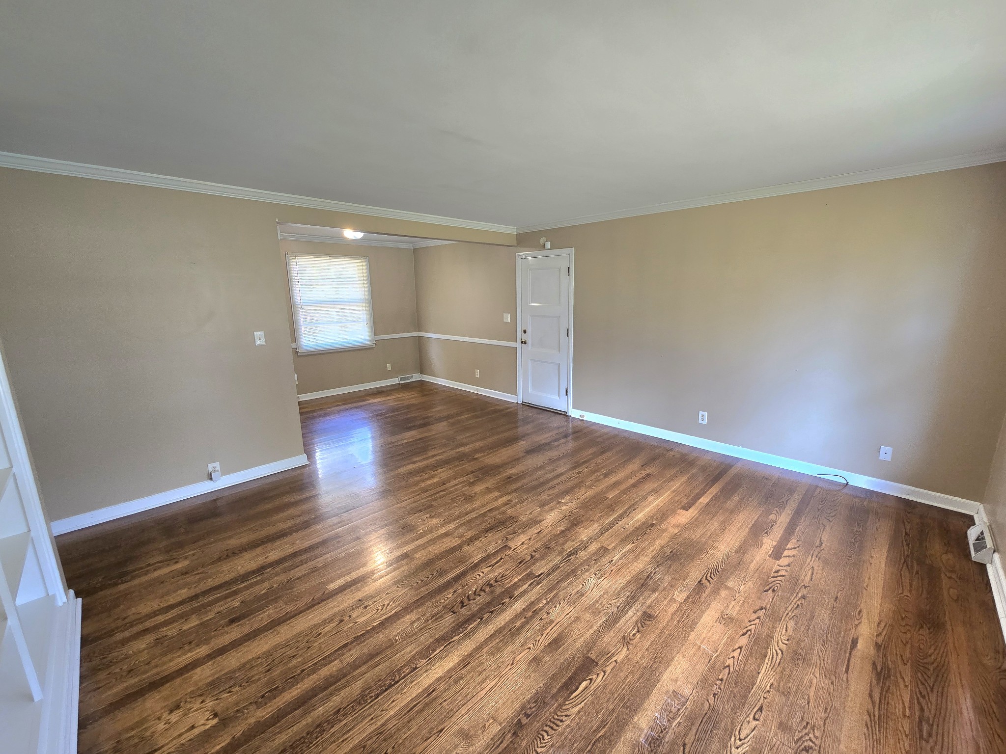 213 Jackson Heights Road Columbia, TN 38401 - Photo 4 of 19 a view of empty room with wooden floor and fan