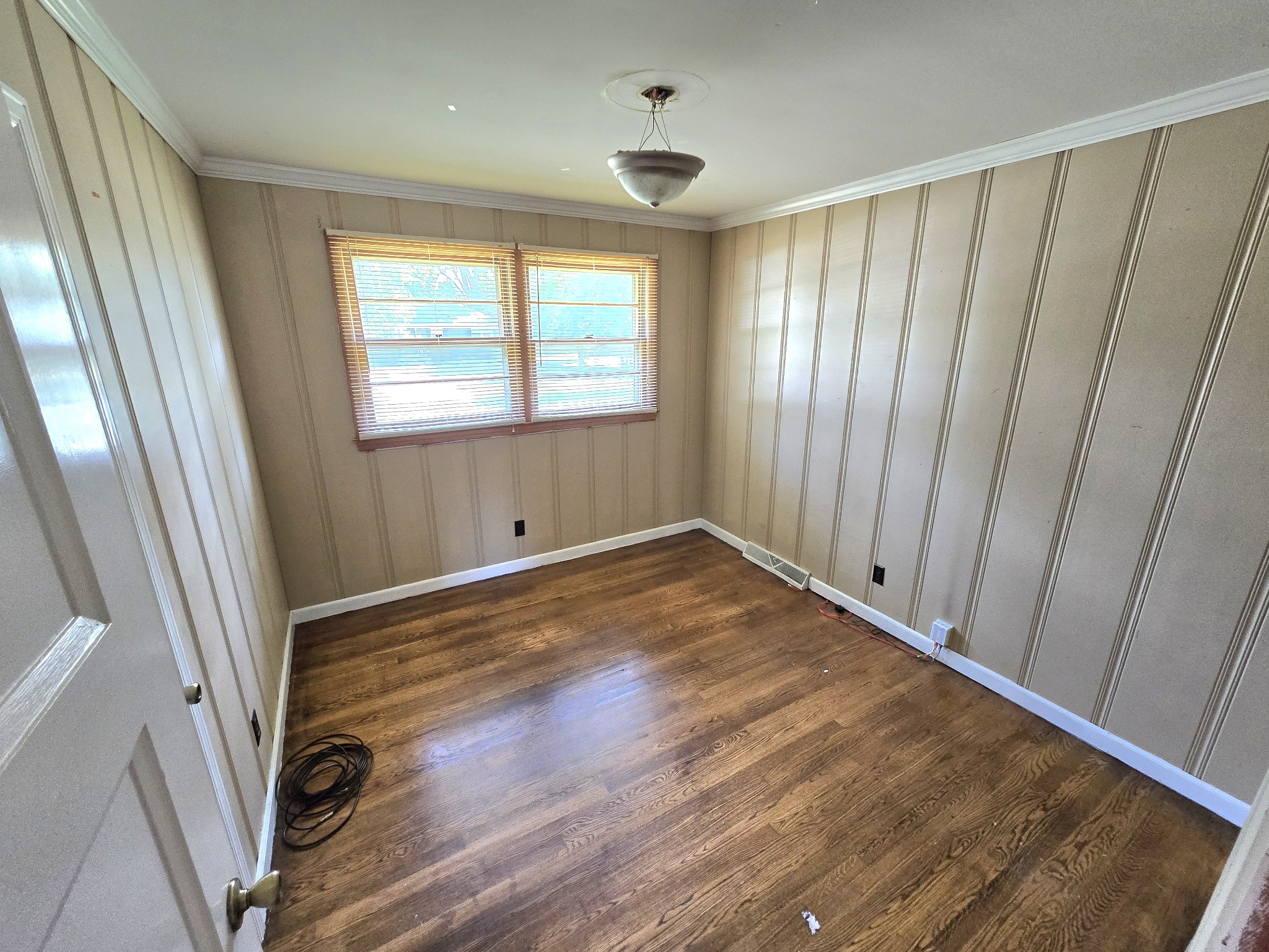 213 Jackson Heights Road Columbia, TN 38401 - Photo 10 of 19 a view of empty room with wooden floor and fan