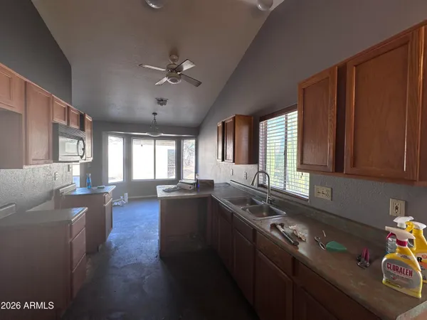 a kitchen with granite countertop lots of counter top space
