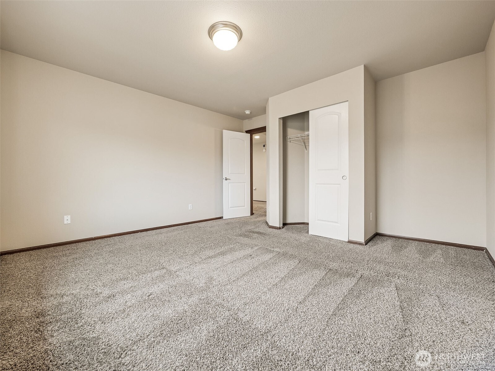 9432 202nd Street East Graham, WA 98338 - Photo 22 of 35 an empty room with a natural light