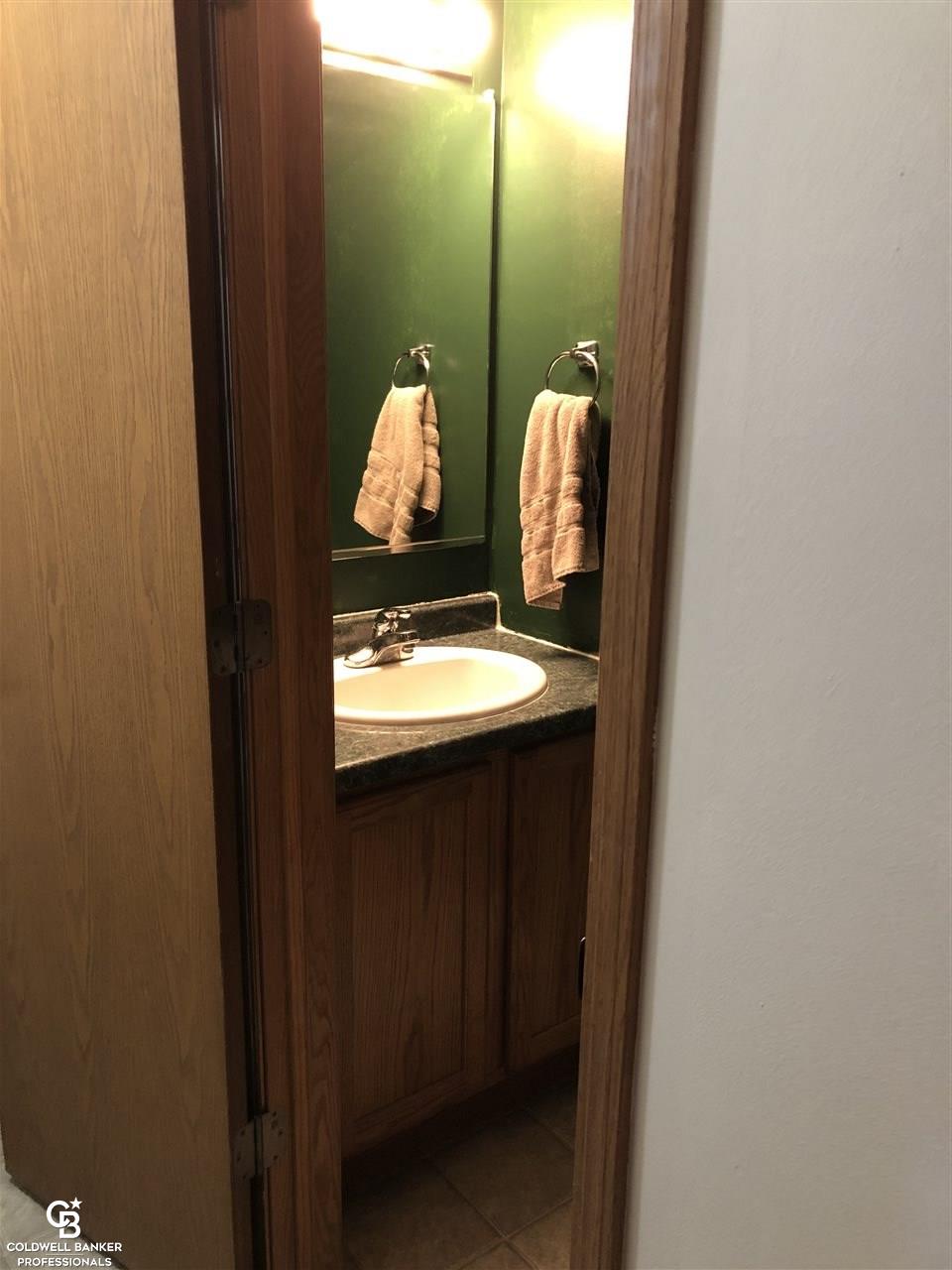 1103 East Galbraith Line Road Melvin, MI 48454 - Photo 23 of 43 Bathroom when you come in from garage