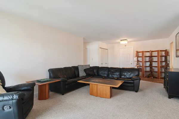 a living room with furniture and a couch