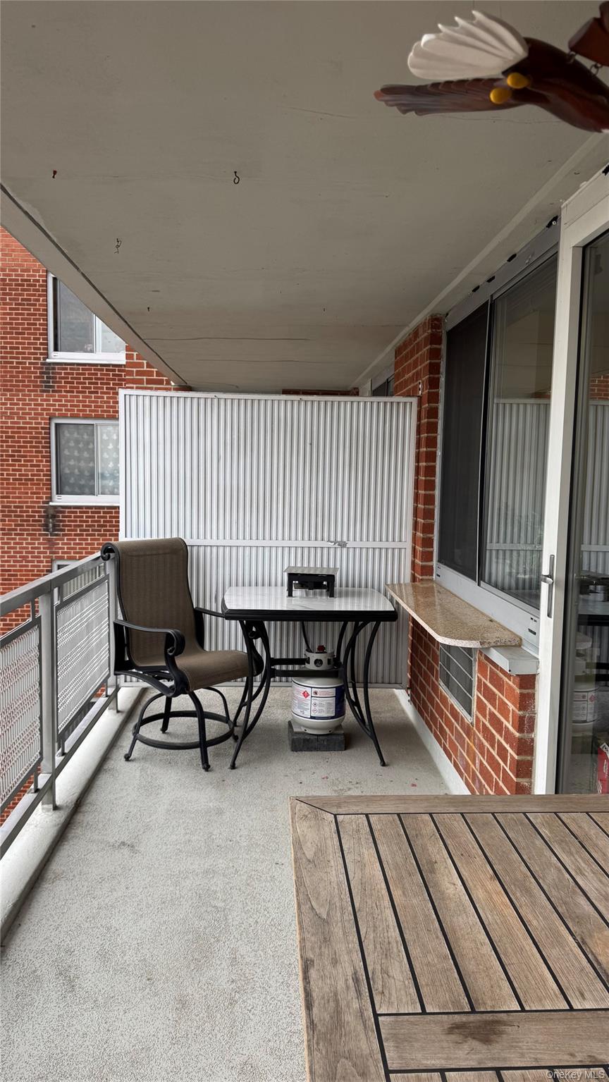 220-55 46th Avenue, Unit 10D Queens, NY 11361 - Photo 16 of 32 Balcony featuring ceiling fan