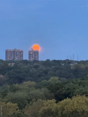 a room with furniture and a flat screen tv