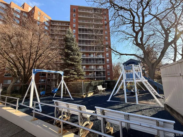 a view of street with parked cars