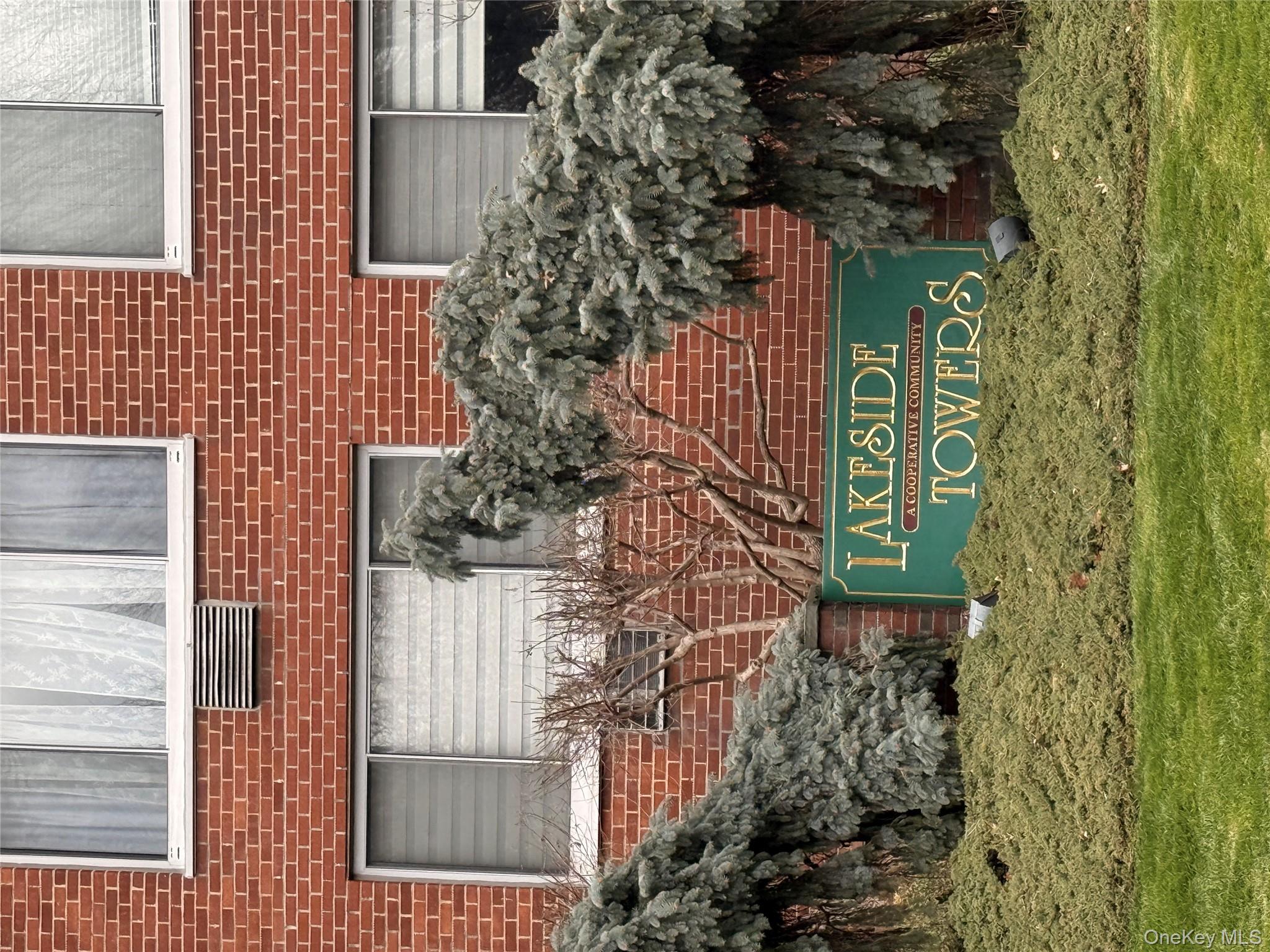 220-55 46th Avenue, Unit 10D Queens, NY 11361 - Photo 30 of 32 View of community sign