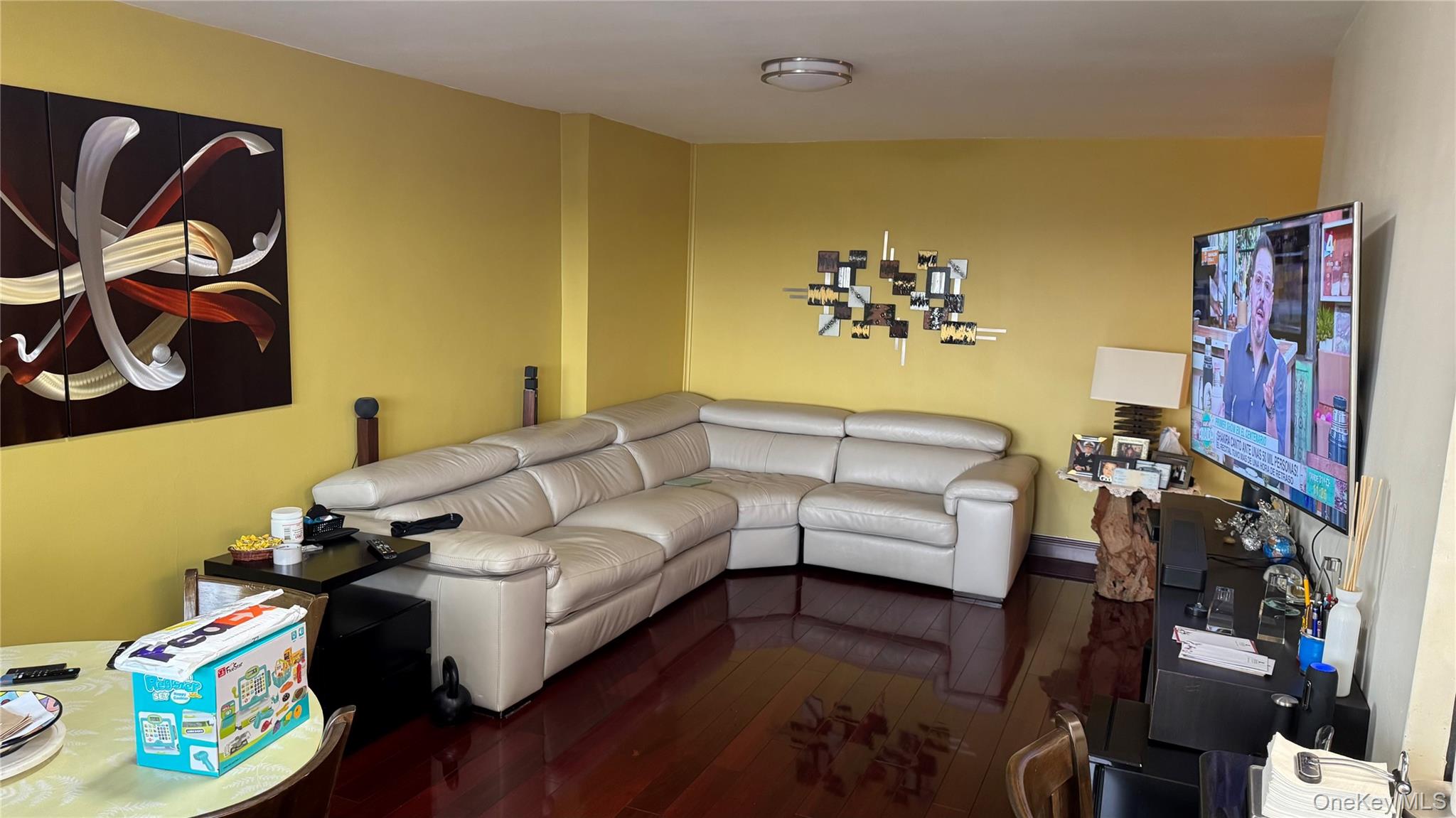 220-55 46th Avenue, Unit 10D Queens, NY 11361 - Photo 8 of 32 Living room with hardwood / wood-style flooring