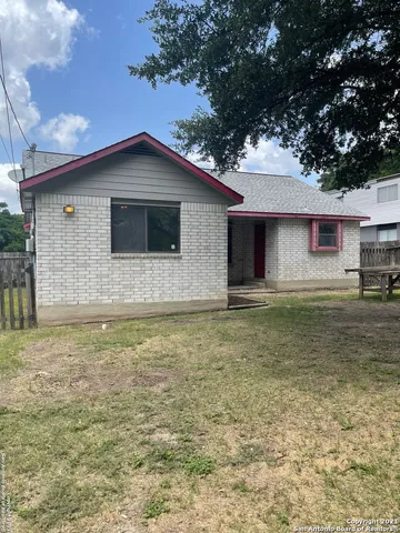 a front view of house with yard