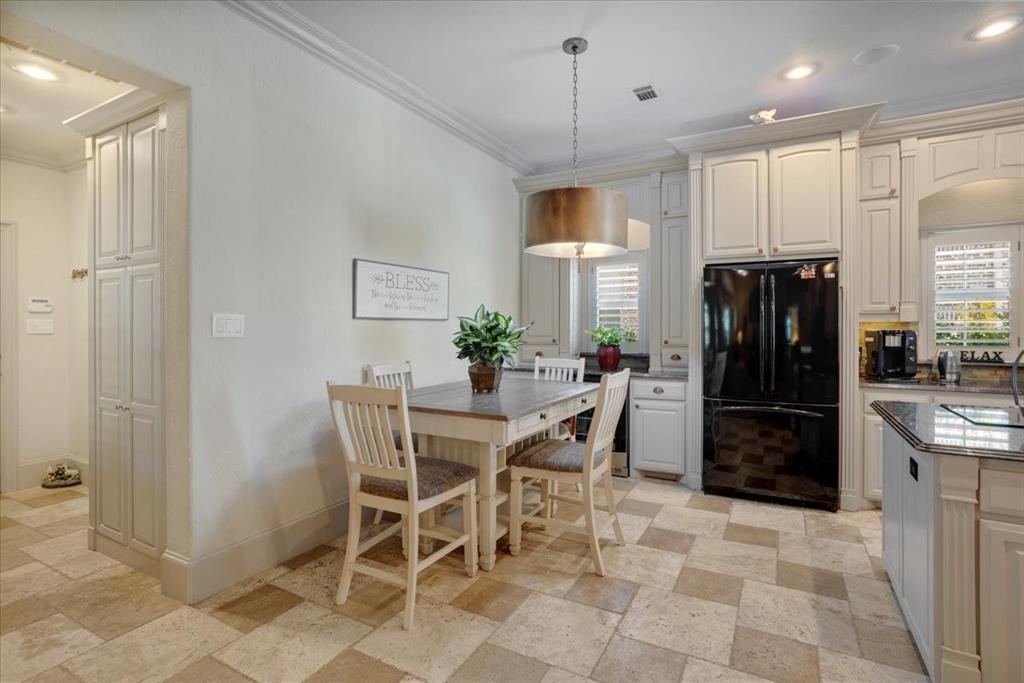 3001 Canyon Creek Drive Sherman, TX 75092 - Photo 13 of 37 a kitchen with stainless steel appliances granite countertop a refrigerator and a stove top oven