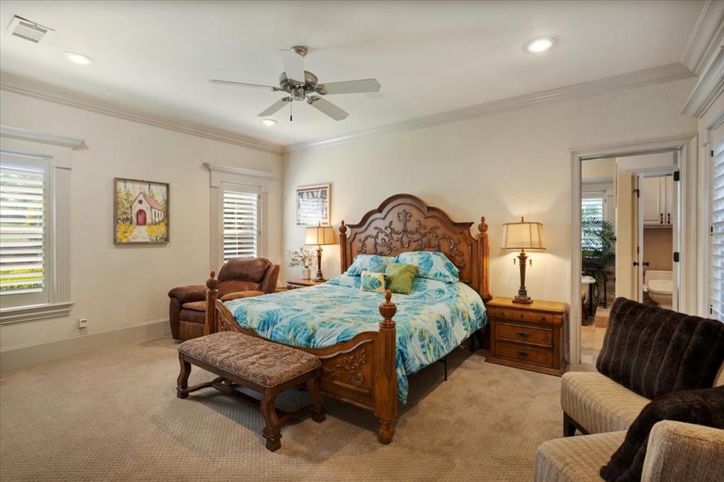 3001 Canyon Creek Drive Sherman, TX 75092 - Photo 16 of 37 a bedroom with a bed and wooden floor