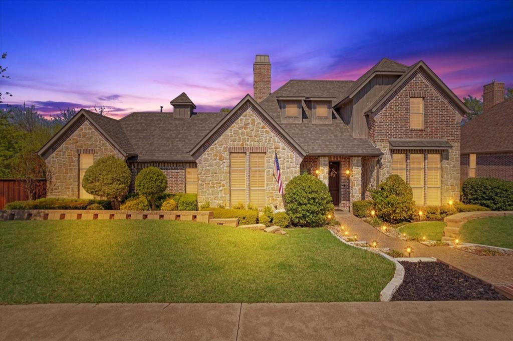 3001 Canyon Creek Drive Sherman, TX 75092 - Photo 2 of 37 a front view of a house with a yard