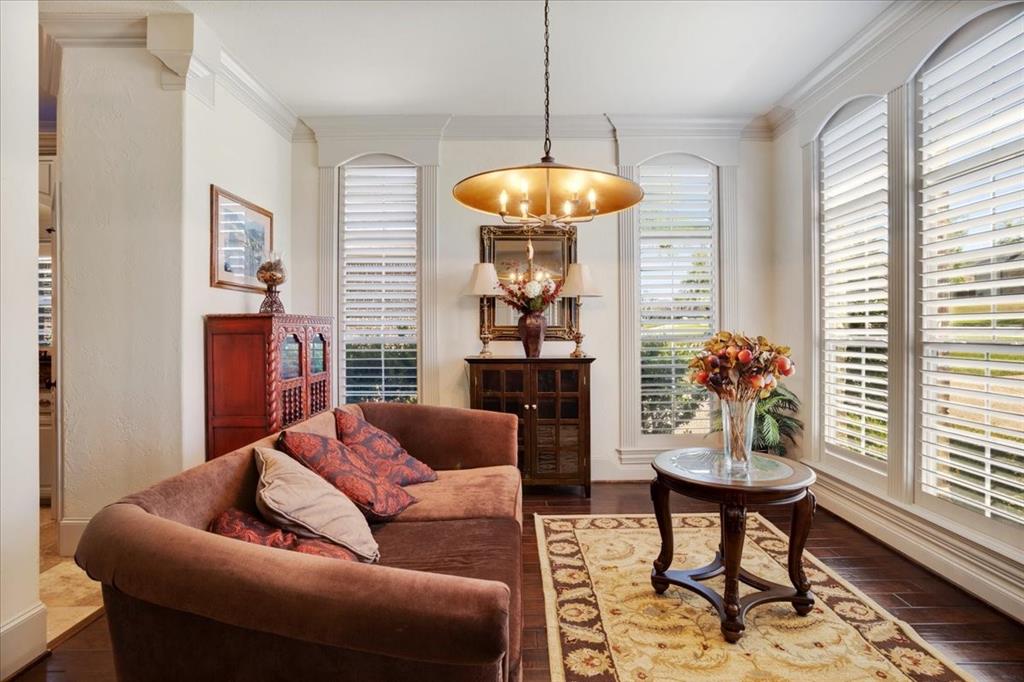 3001 Canyon Creek Drive Sherman, TX 75092 - Photo 22 of 37 a living room with furniture a chandelier and a window