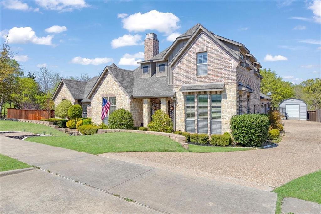 3001 Canyon Creek Drive Sherman, TX 75092 - Photo 3 of 37 a front view of a house with garden
