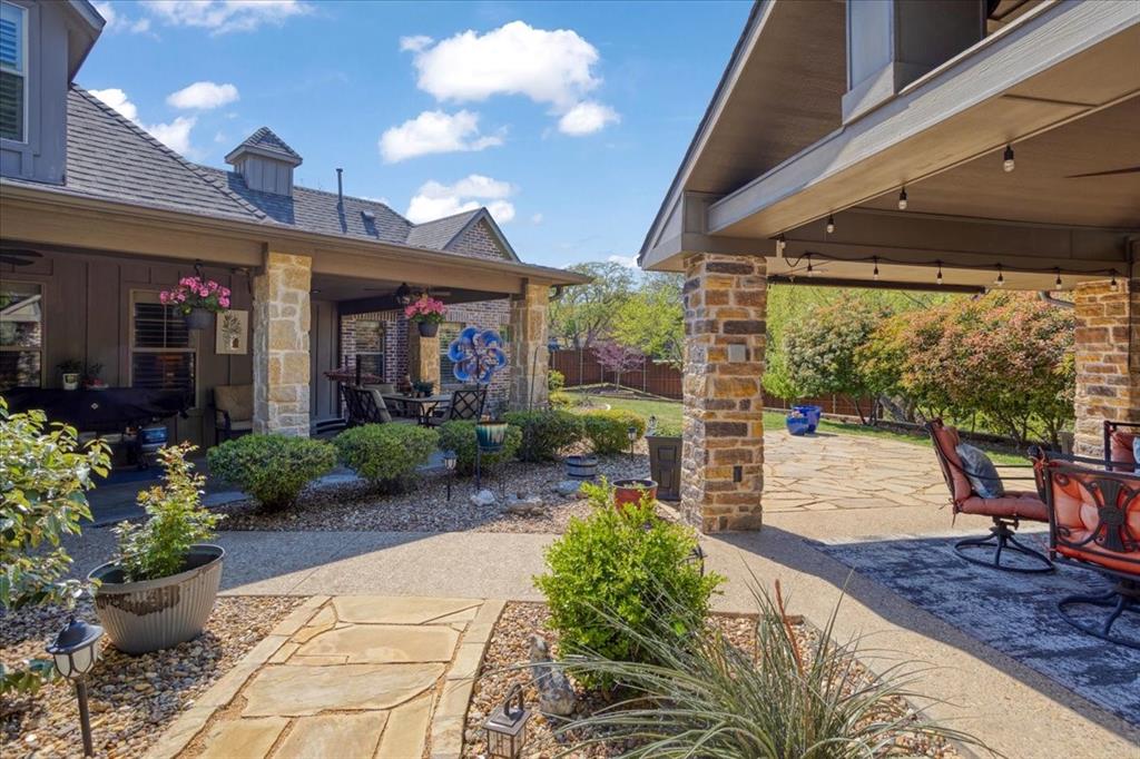 3001 Canyon Creek Drive Sherman, TX 75092 - Photo 34 of 37 a view of a chairs and table in the patio