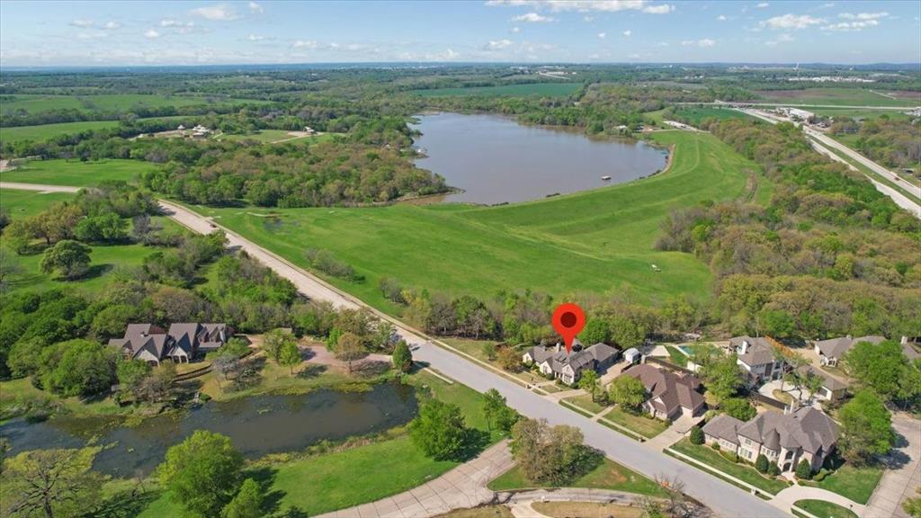 3001 Canyon Creek Drive Sherman, TX 75092 - Photo 37 of 37 an aerial view of a house with a yard and lake view