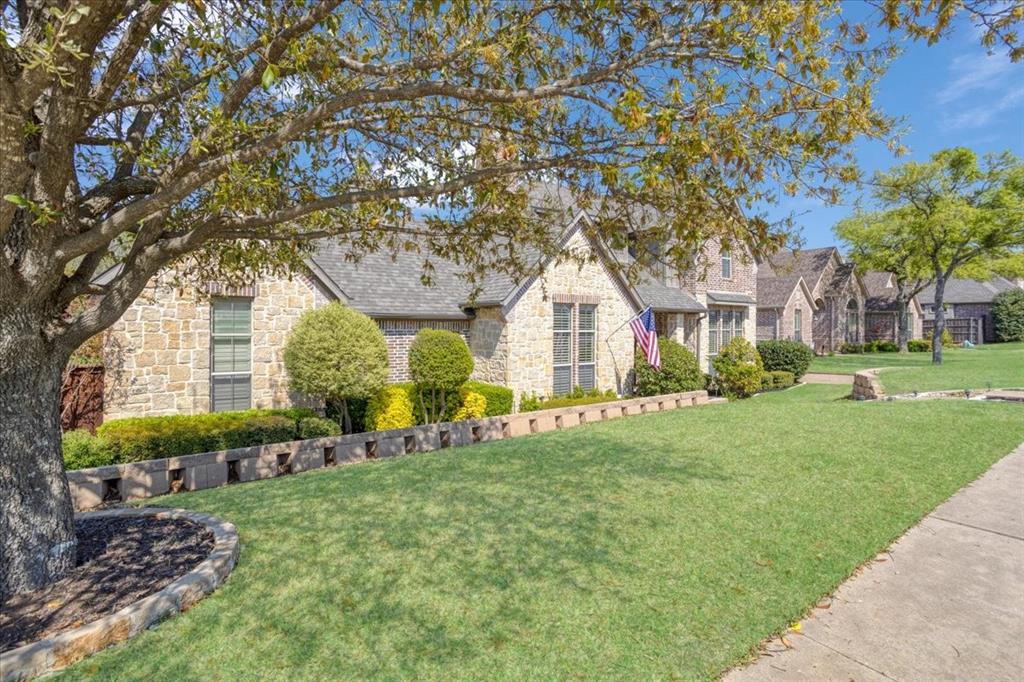 3001 Canyon Creek Drive Sherman, TX 75092 - Photo 4 of 37 a front view of house with yard and green space