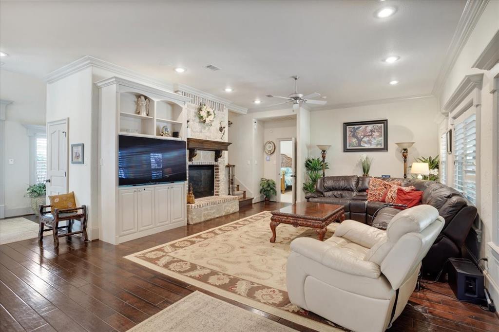 3001 Canyon Creek Drive Sherman, TX 75092 - Photo 7 of 37 a living room with furniture and a flat screen tv