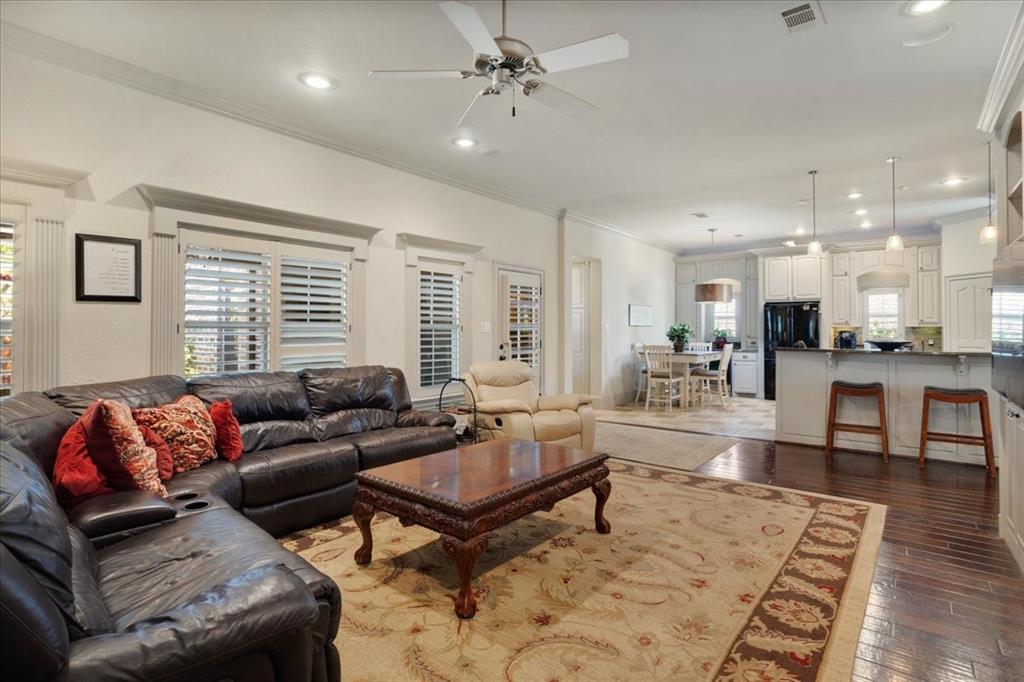 3001 Canyon Creek Drive Sherman, TX 75092 - Photo 9 of 37 a living room with furniture and wooden floor