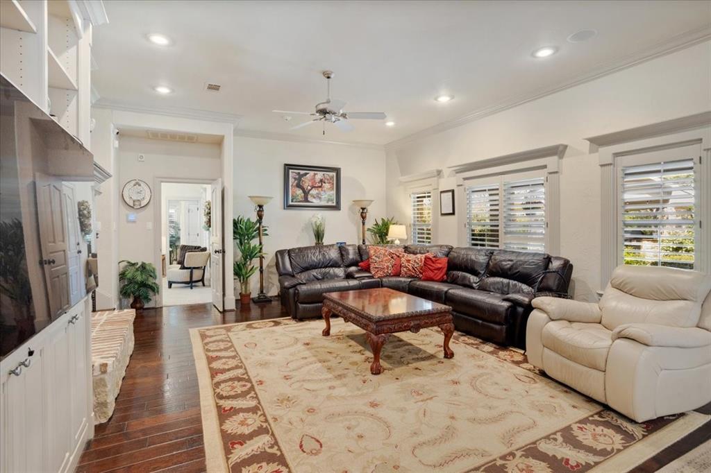 3001 Canyon Creek Drive Sherman, TX 75092 - Photo 10 of 37 a living room with furniture and a flat screen tv