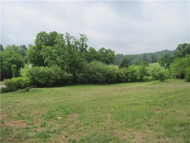 6416 Prospect Road Prospect, TN 38477 - Photo 3 of 9 a view of a field with an trees in the background