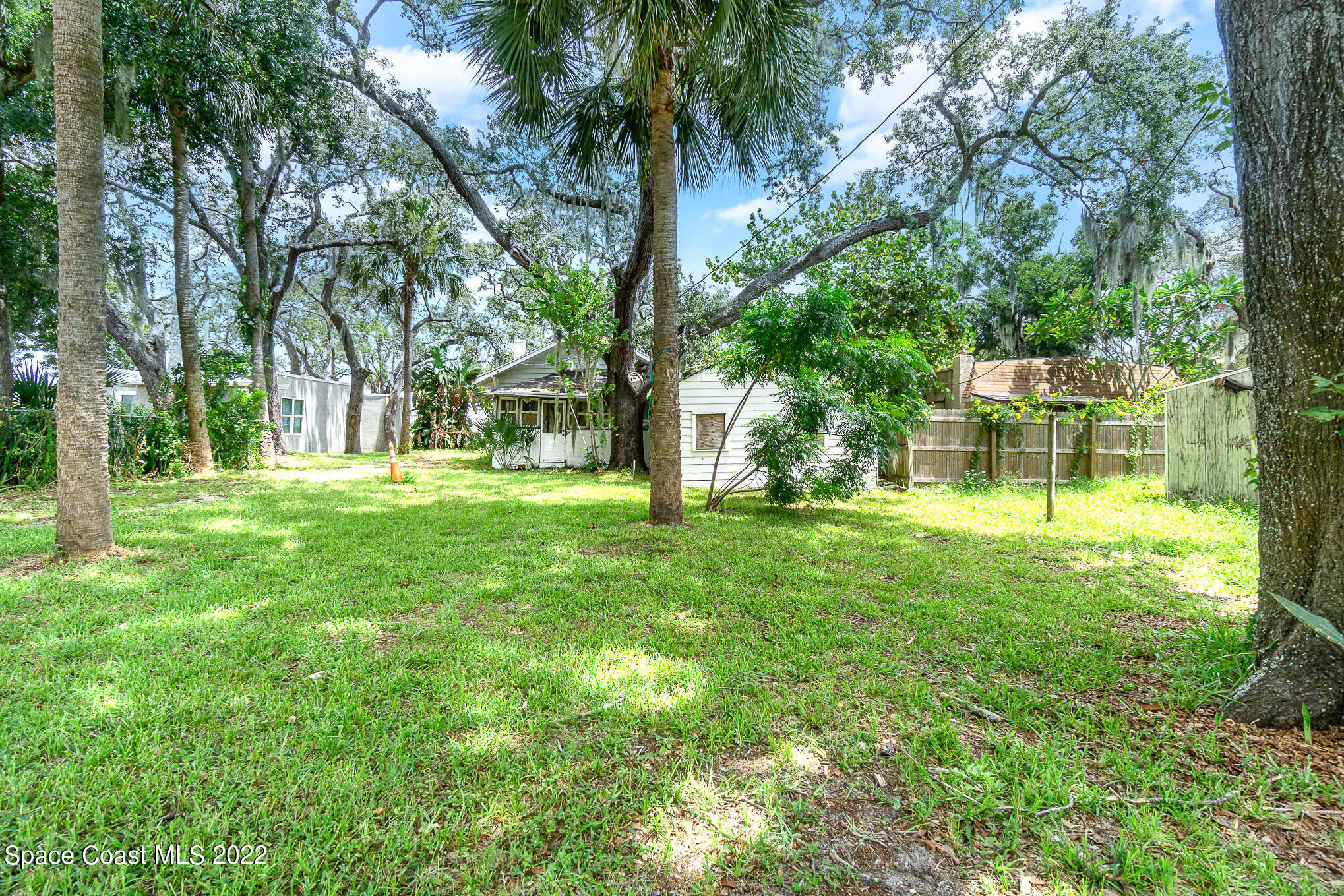 702 Shady Lane Melbourne, FL 32935 - Photo 1 of 4 a garden with trees
