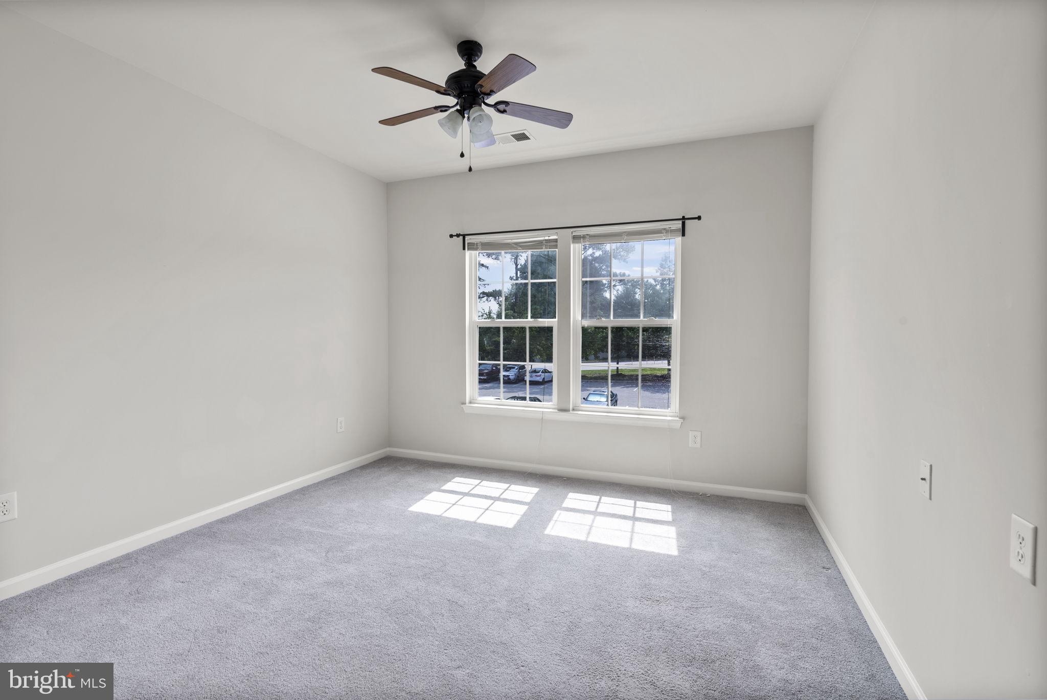 1622 Hardwick Court, Unit 201 Hanover, MD 21076 - Photo 14 of 42 a view of an empty room with a window