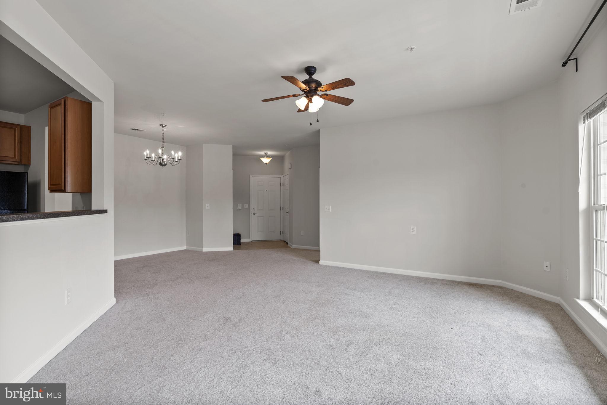 1622 Hardwick Court, Unit 201 Hanover, MD 21076 - Photo 21 of 42 wooden floor in an empty room