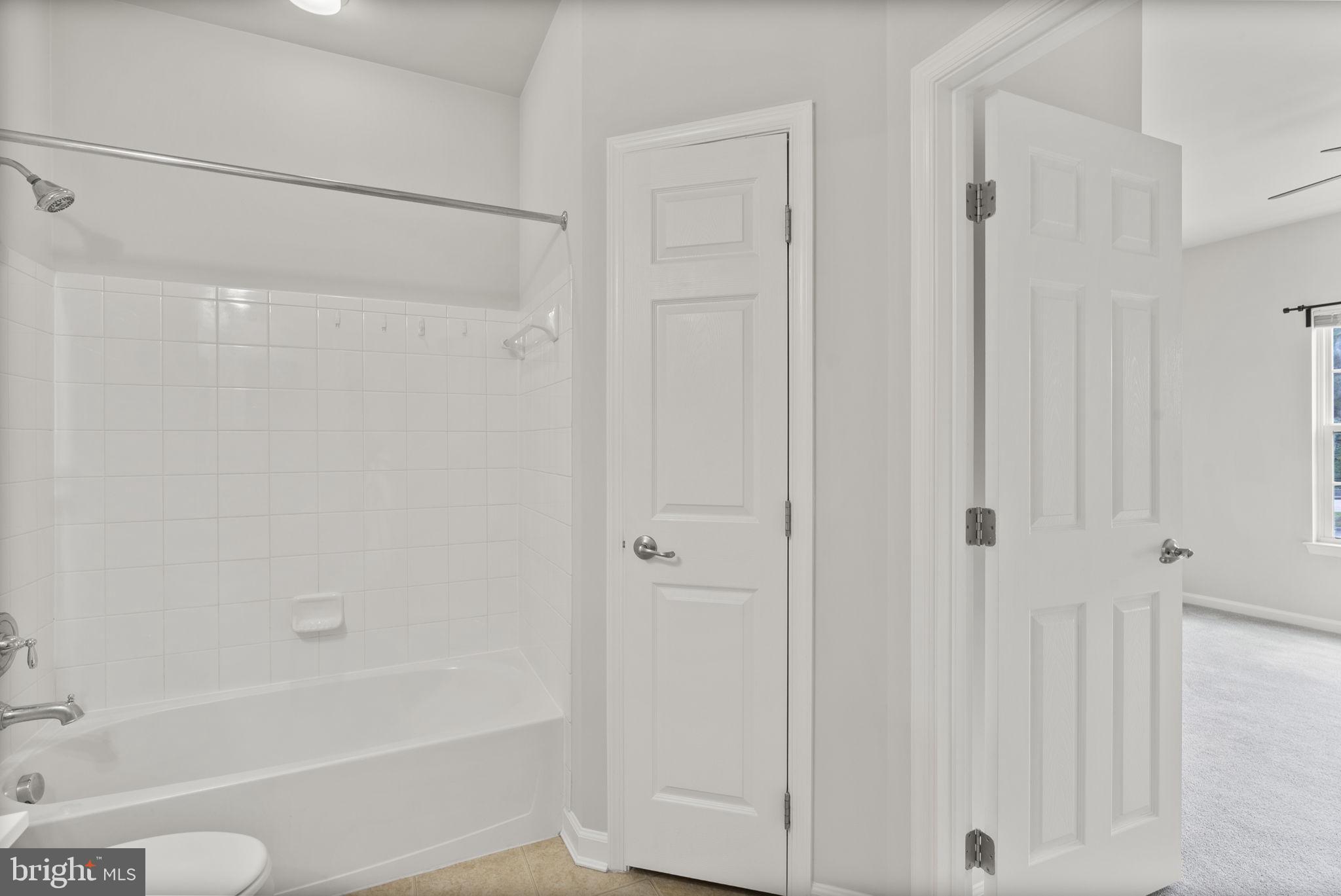 1622 Hardwick Court, Unit 201 Hanover, MD 21076 - Photo 28 of 42 a bathroom with a bathtub
