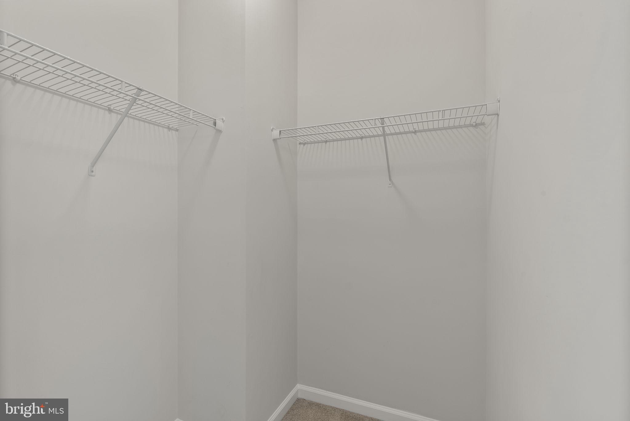 1622 Hardwick Court, Unit 201 Hanover, MD 21076 - Photo 34 of 42 a view of a room with racks on the wall