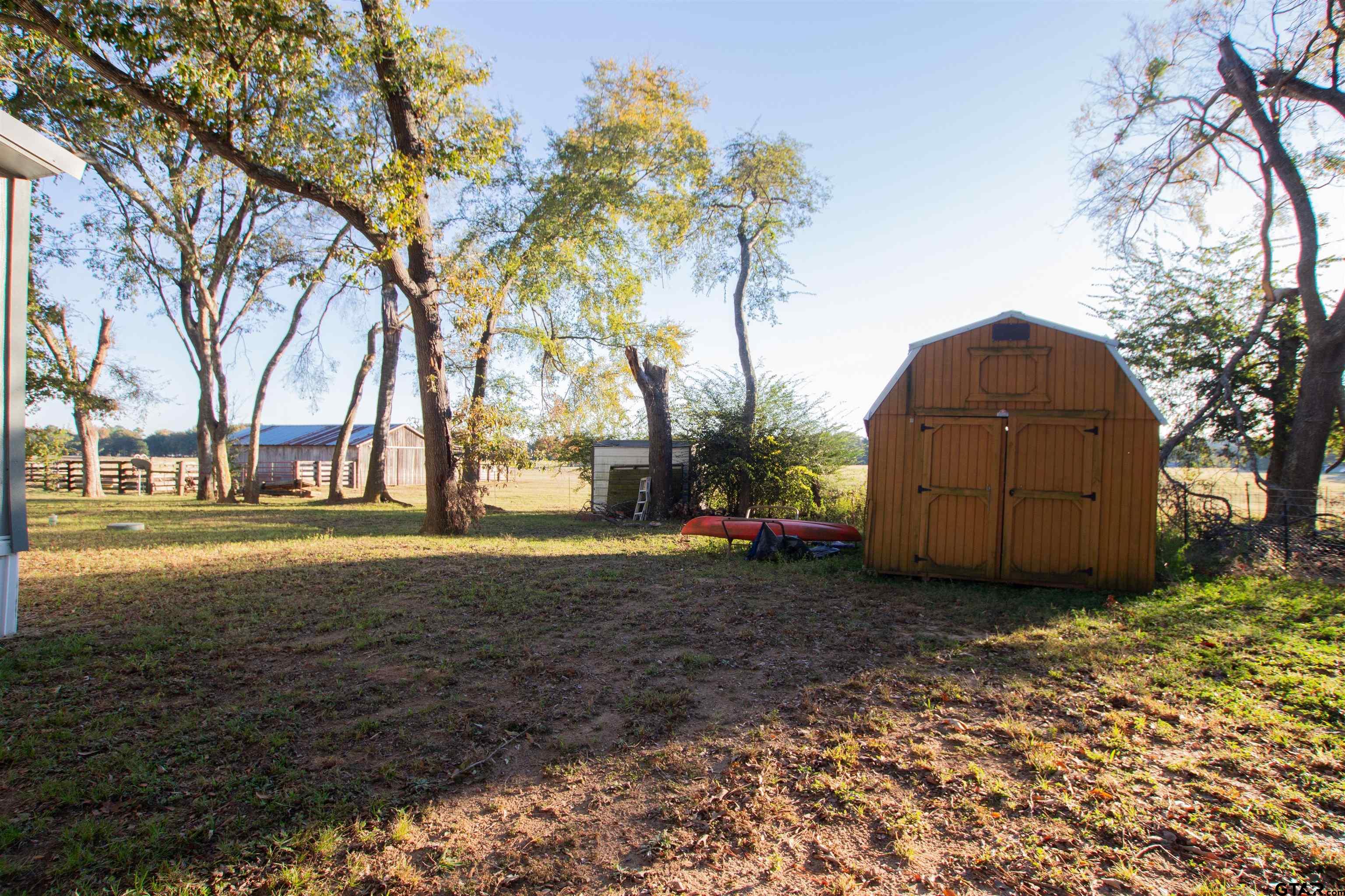 22908 Shell Shore Drive Bullard, TX 75757 - Photo 20 of 20 a backyard of a house with lots of green space