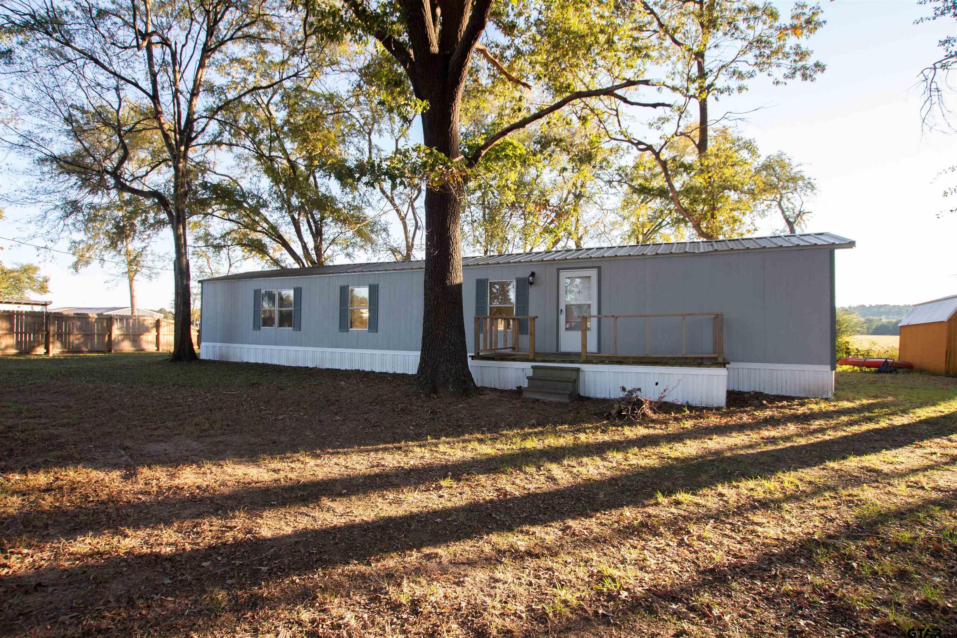 22908 Shell Shore Drive Bullard, TX 75757 - Photo 3 of 20 a view of a house with a yard covered in snow