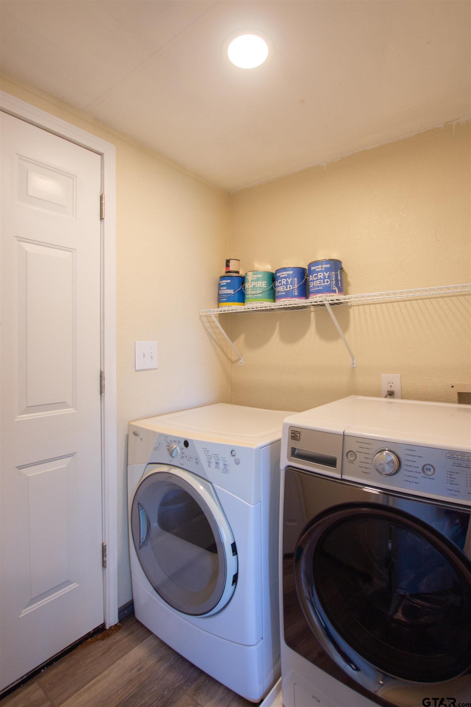 22908 Shell Shore Drive Bullard, TX 75757 - Photo 8 of 20 a utility room with dryer and washer
