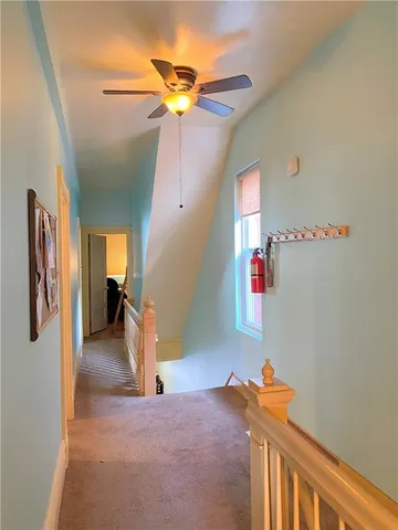 a view of a livingroom with a staircase