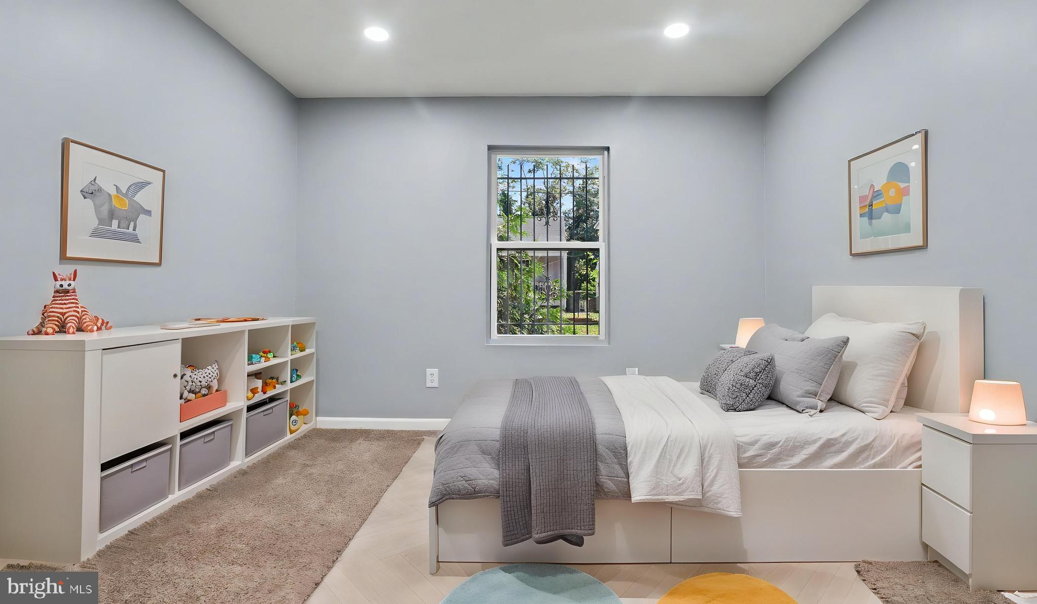 4203 Shell Street Capitol Heights, MD 20743 - Photo 24 of 47 a bedroom with a bed and a window