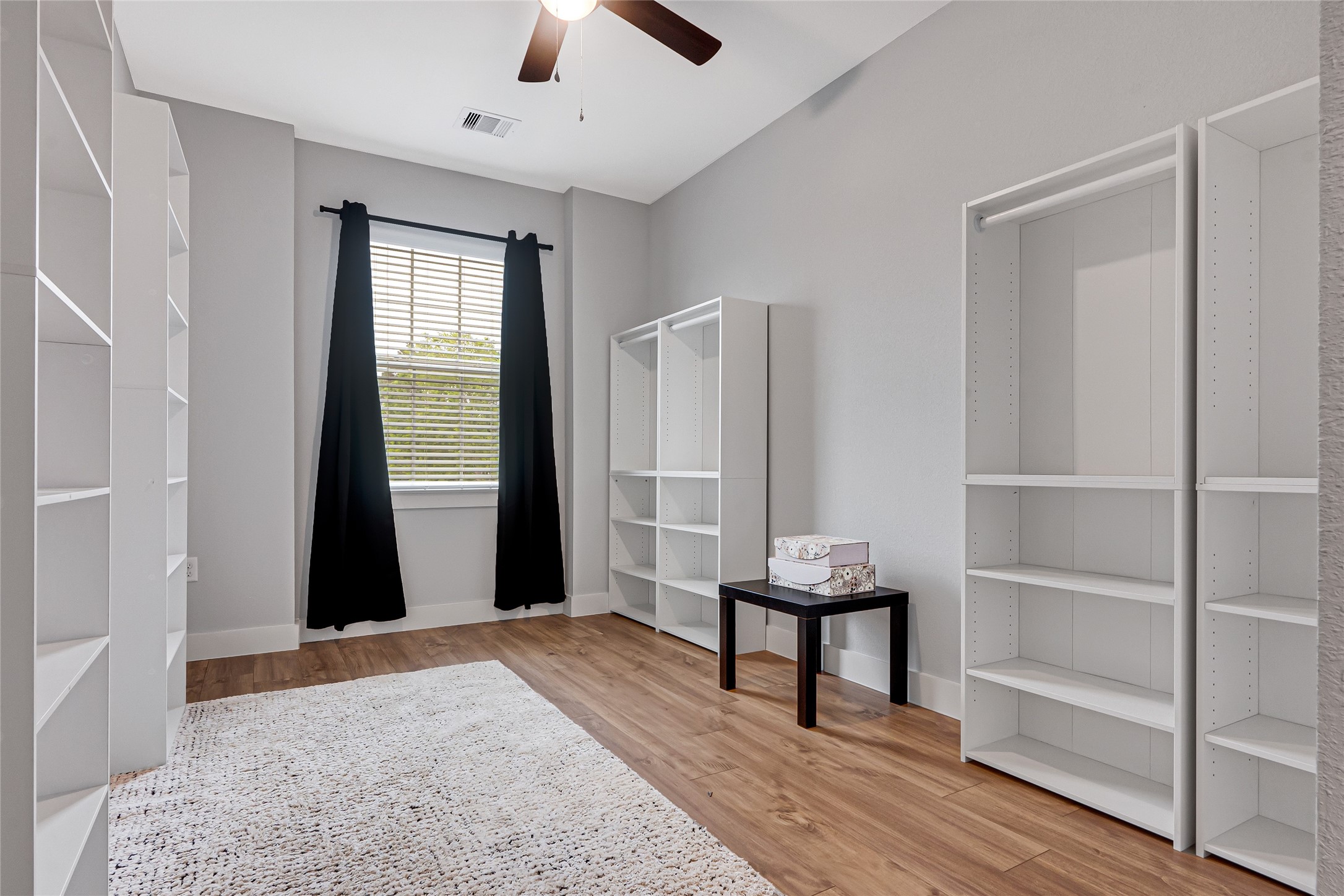 10021 Alfred Lane, Unit A Houston, TX 77041 - Photo 27 of 29 a bedroom with a bed and a window