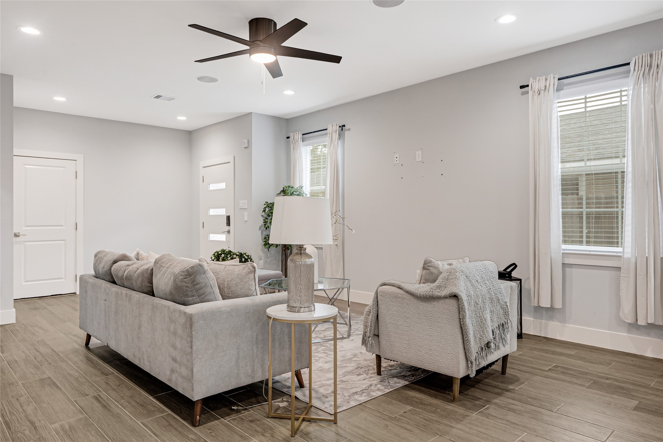 10021 Alfred Lane, Unit A Houston, TX 77041 - Photo 5 of 29 a living room with furniture and a window