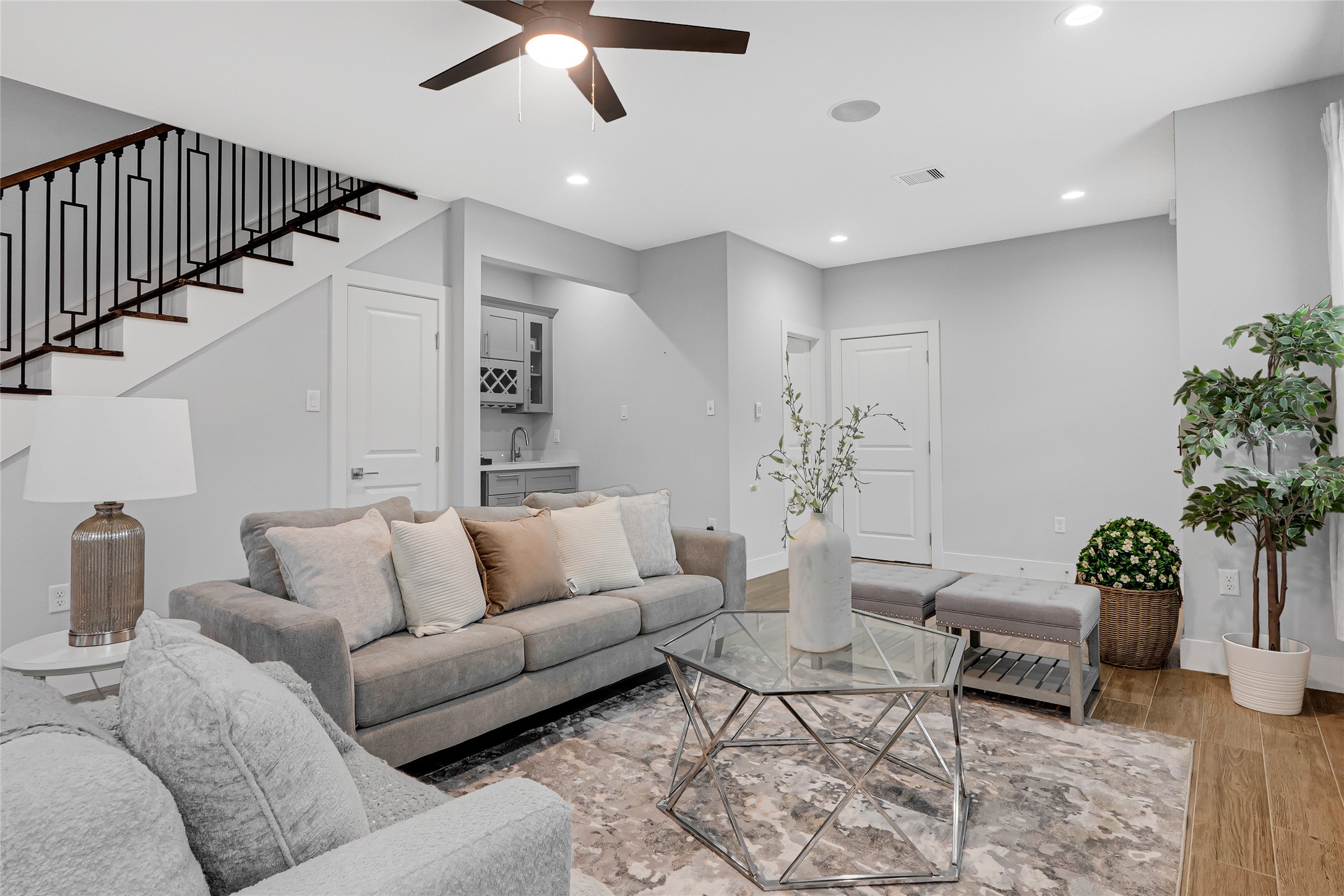 10021 Alfred Lane, Unit A Houston, TX 77041 - Photo 6 of 29 a living room with furniture potted plant and a chandelier