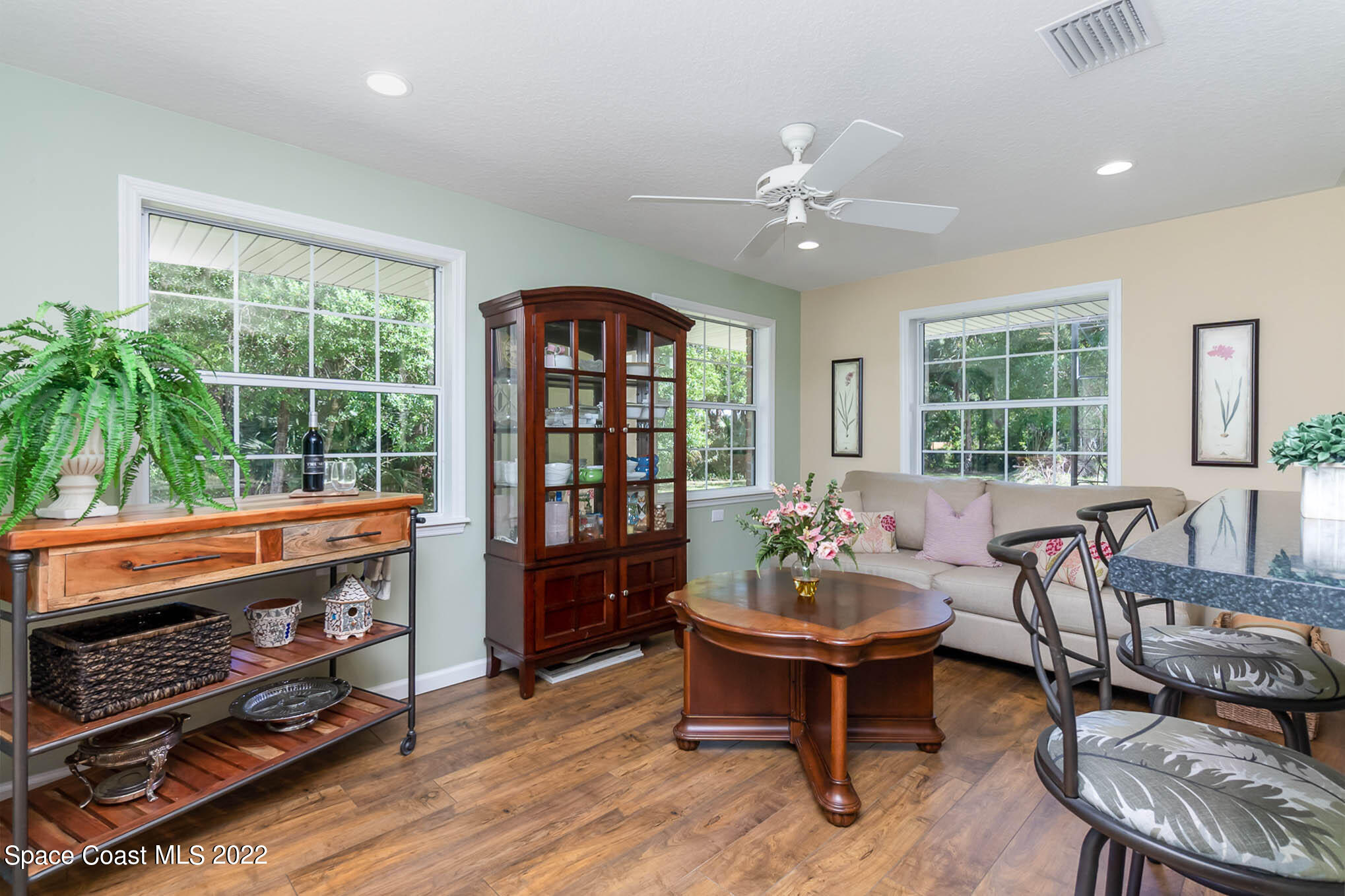 3895 Corey Road Malabar, FL 32950 - Photo 6 of 21 a living room with furniture and a window