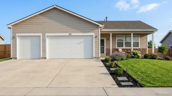 front view of a house and a yard