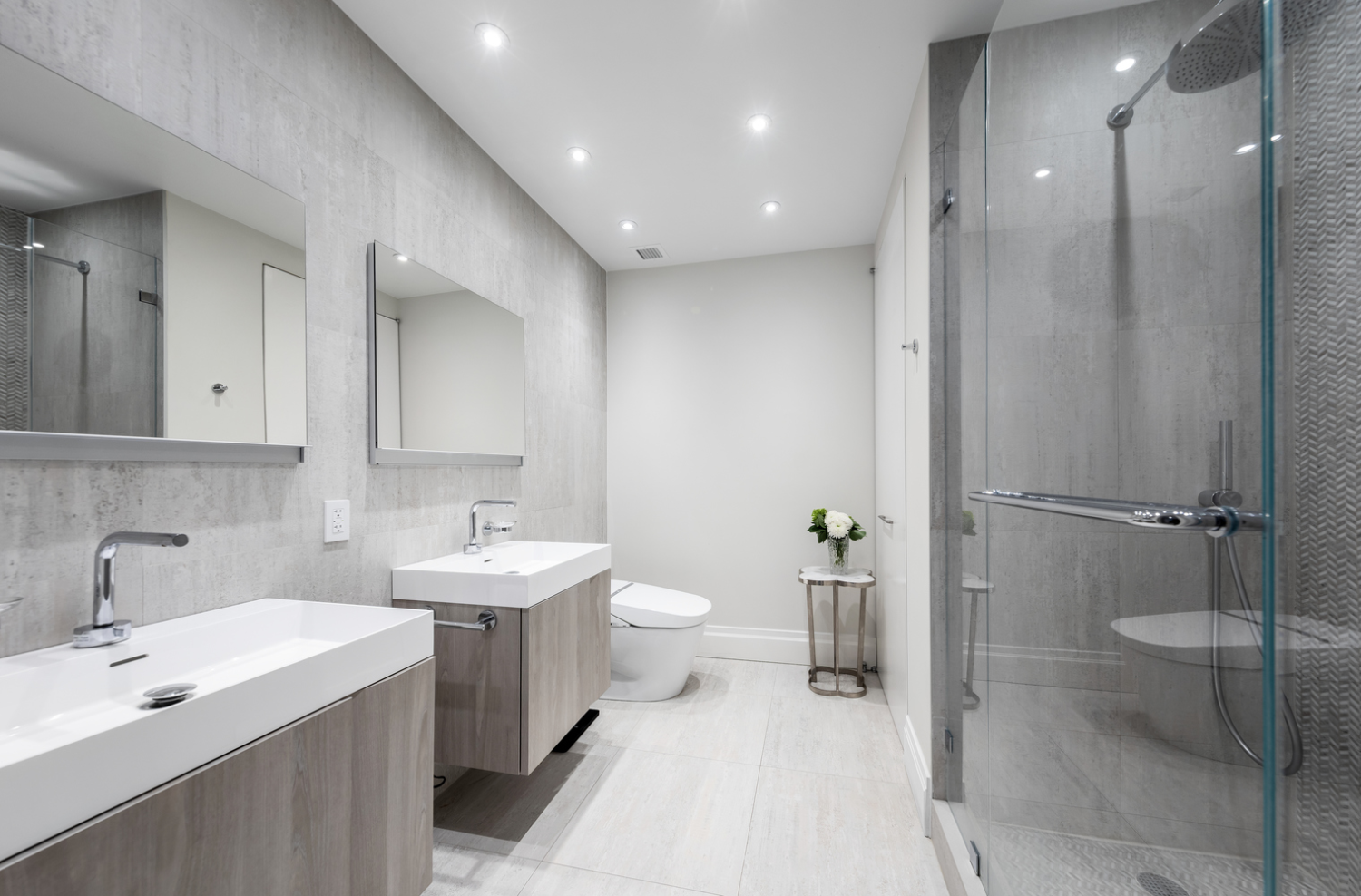 220 Riverside Boulevard, Unit 4H Manhattan, NY 10069 - Photo 10 of 15 a bathroom with a toilet a sink and mirror