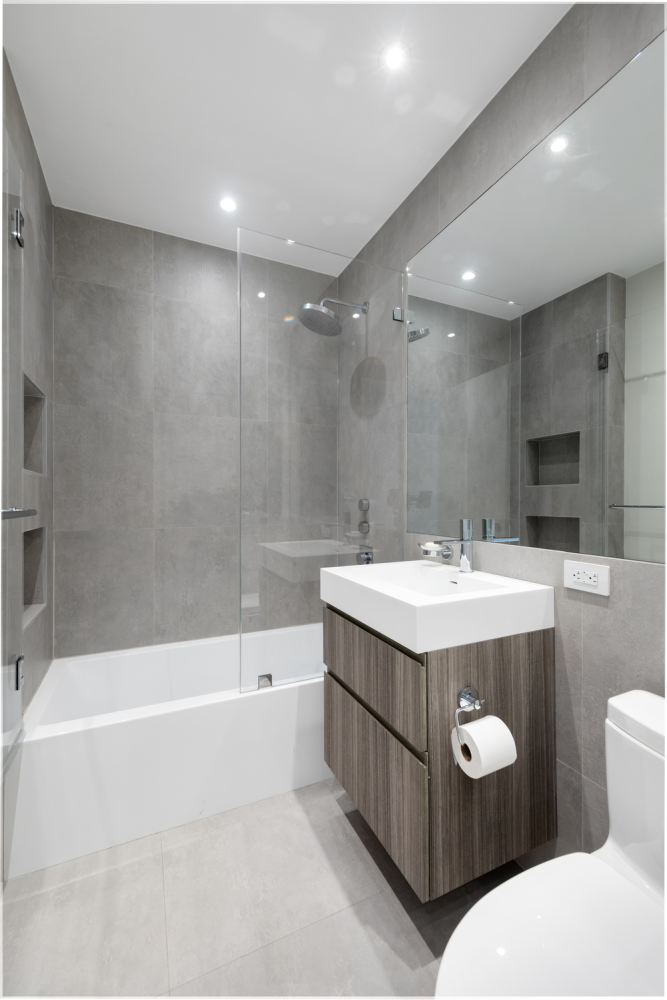 220 Riverside Boulevard, Unit 4H Manhattan, NY 10069 - Photo 13 of 15 a bathroom with a sink a toilet and bathtub