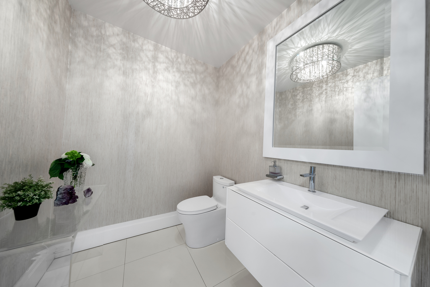 220 Riverside Boulevard, Unit 4H Manhattan, NY 10069 - Photo 14 of 15 a bathroom with a toilet sink and mirror