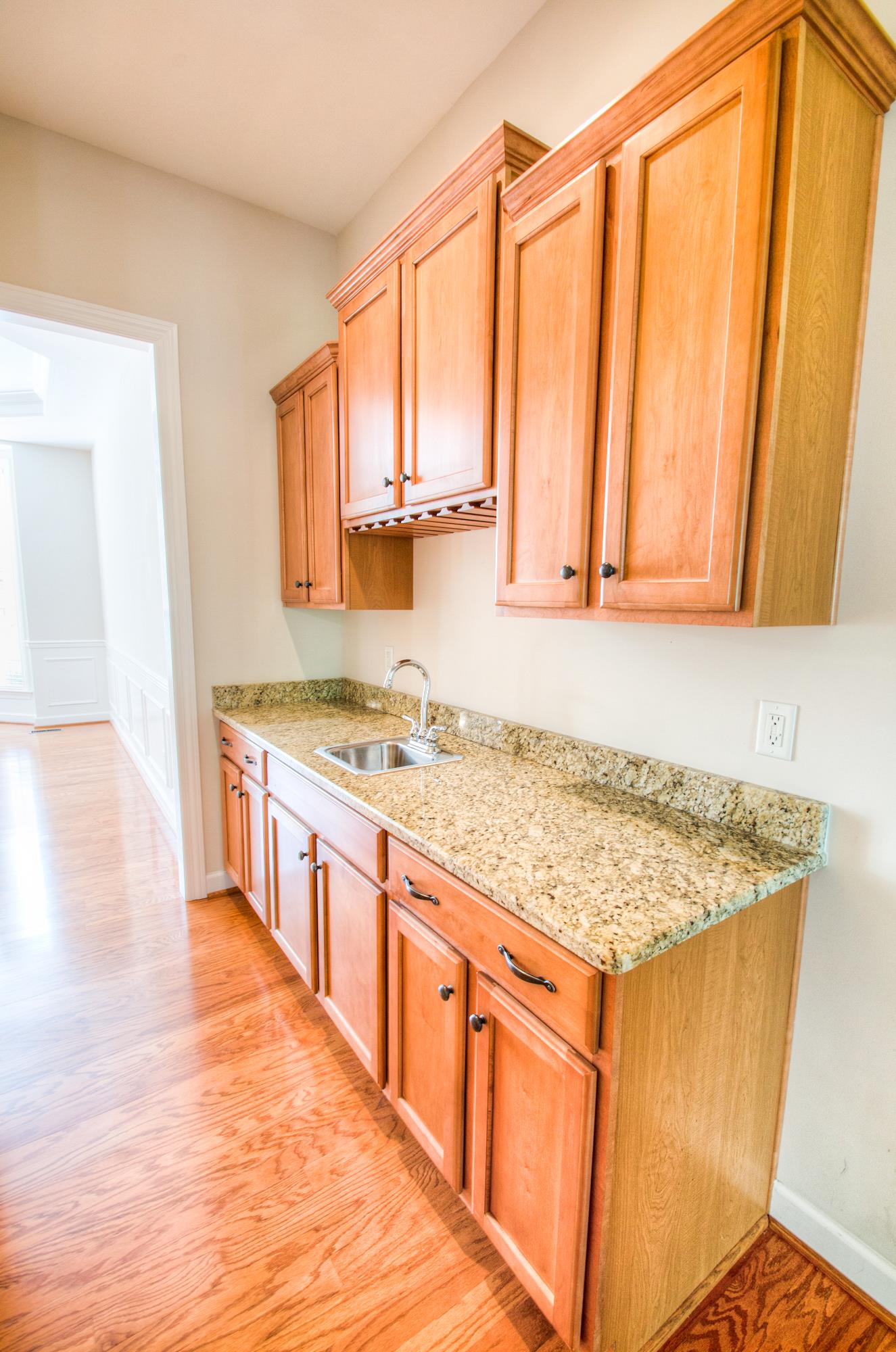 5512 Rathkeale Lane Franklin, TN 37067 - Photo 14 of 30 a kitchen with stainless steel appliances granite countertop a stove a sink and a microwave