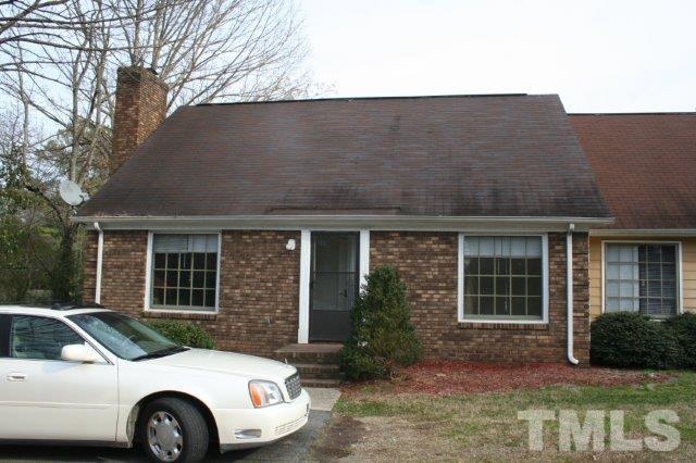 315 Jones Franklin Road Raleigh, NC 27606 - Photo 1 of 5 a front view of a house with a garden