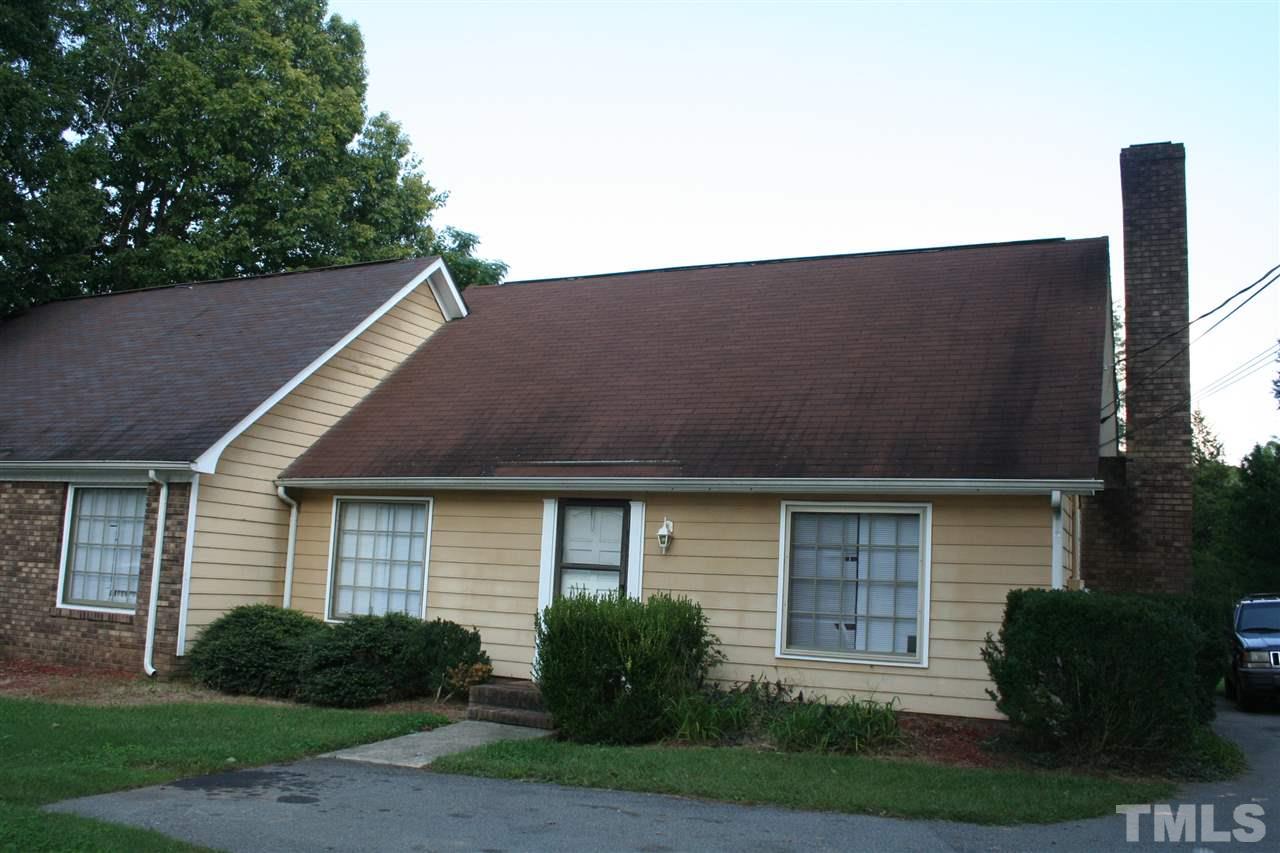315 Jones Franklin Road Raleigh, NC 27606 - Photo 2 of 5 a front view of a house with garden