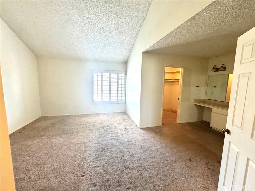 8939 Gallatin Road, Unit 16 Pico Rivera, CA 90660 - Photo 13 of 17 MASTER BED