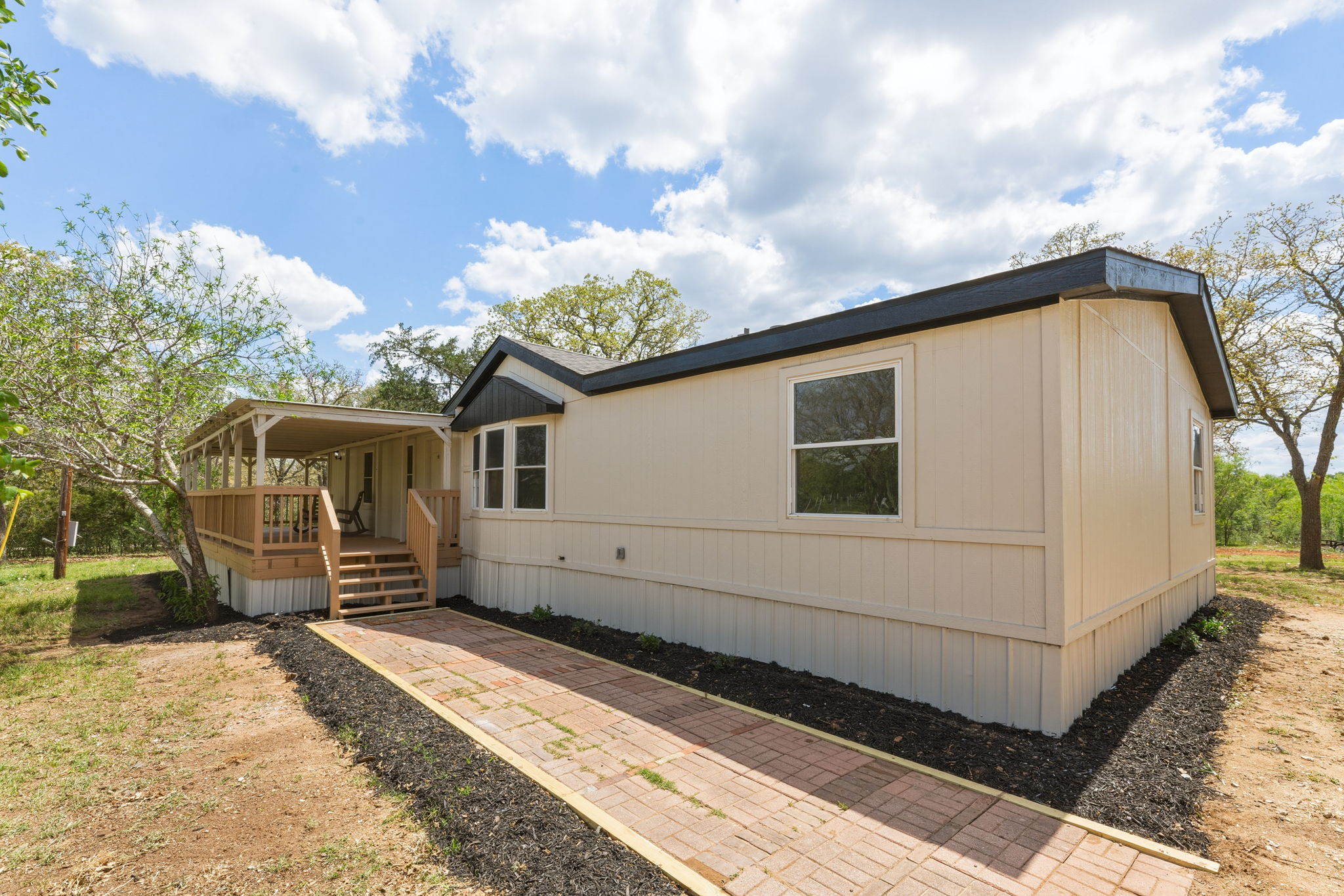 340 Red Hawk Drive Dale, TX 78616 - Photo 2 of 38 View of brick walkway towards front entrance
