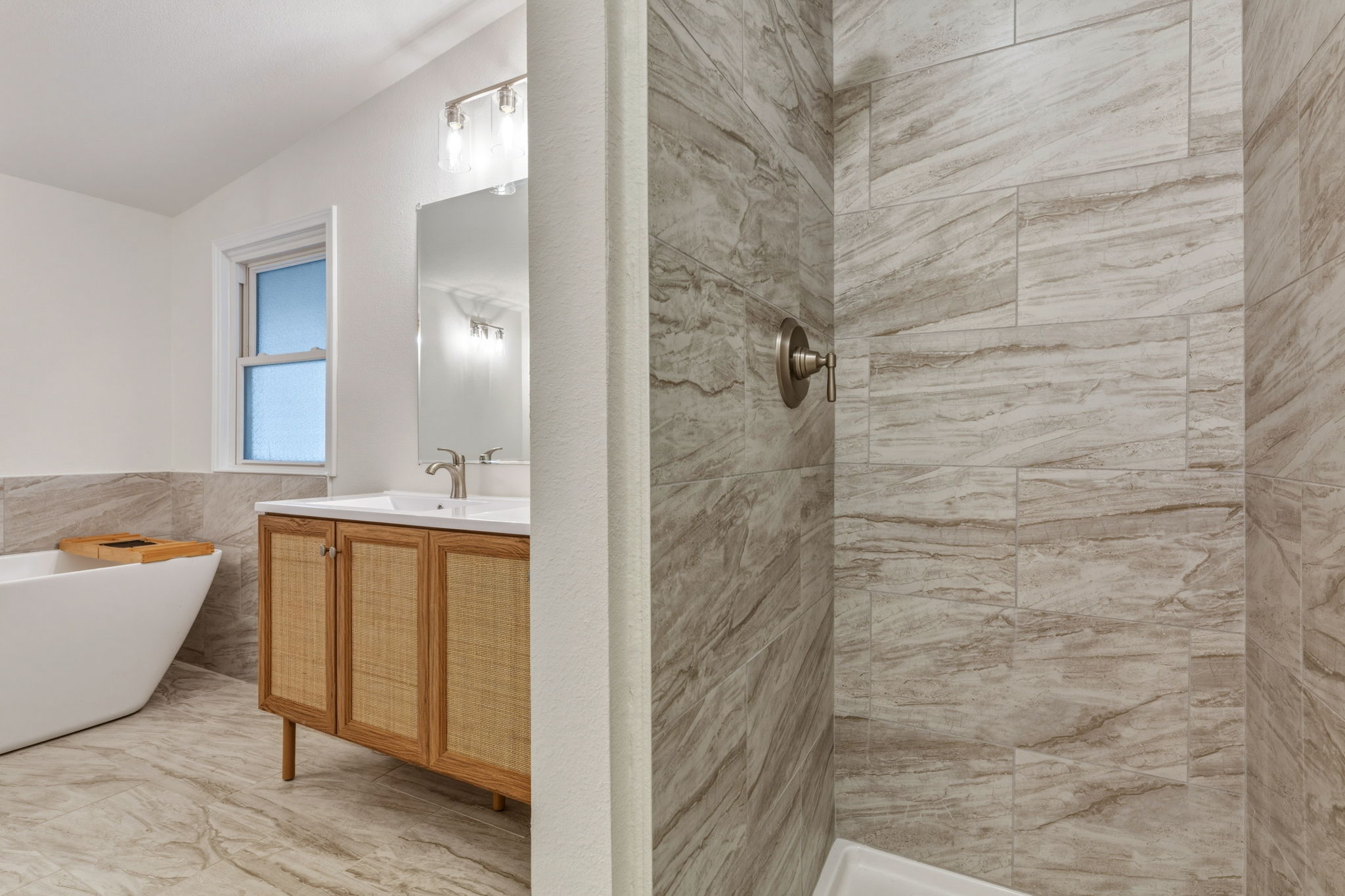 340 Red Hawk Drive Dale, TX 78616 - Photo 21 of 39 Bathroom featuring tile walls, a tile shower, vanity, a soaking tub,