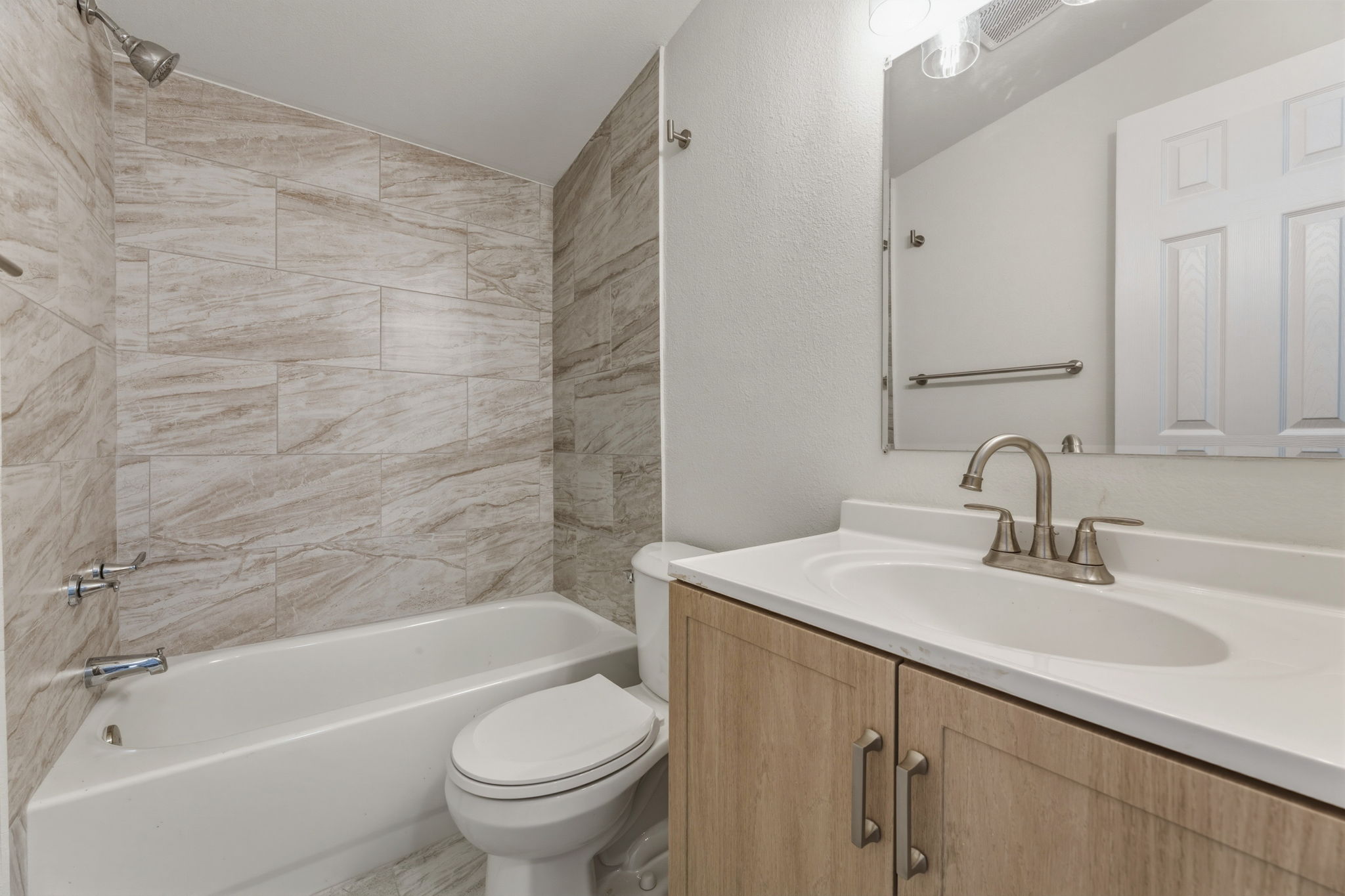 340 Red Hawk Drive Dale, TX 78616 - Photo 26 of 39 Full bath featuring vanity, bathtub / shower combination,